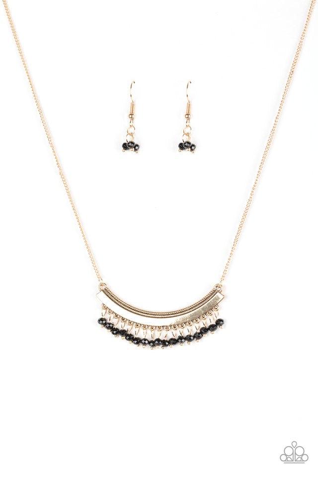 Paparazzi Accessories Fringe Fever - Gold Faceted black beads swing from the bottom of a glistening gold crescent, creating a dainty fringe below the collar for a playful tribal inspired look. Features an adjustable clasp closure. Sold as one individual n