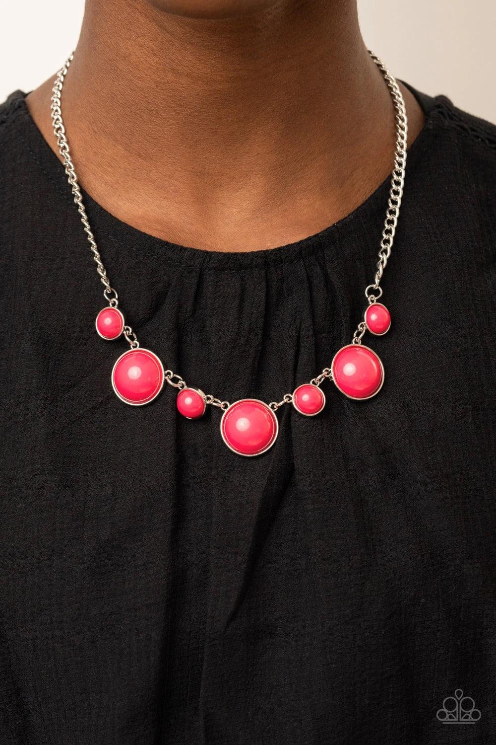 Paparazzi Accessories Prismatically POP-tastic - Pink A bubbly collection of round Raspberry Sorbet beads are pressed into sleek silver fittings as they connect beneath the collar, creating a powerful pop of color. Features an adjustable clasp closure. So