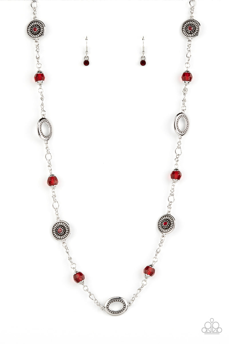 Paparazzi Accessories Glammed up Goals - Red Faceted red beads capped in silver accents and antiqued silver medallions dotted with red rhinestone centers and radiating texture alternate with sections of silver chain creating a charismatic allure across th