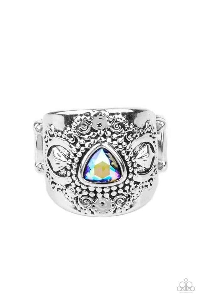 Paparazzi Accessories Magic Maker - Green Featuring an iridescent shimmer, a triangular green rhinestone is pressed into the center of a thick silver band embossed in whimsically studded patterns for an enchanted finish. Features a stretchy band for a fle