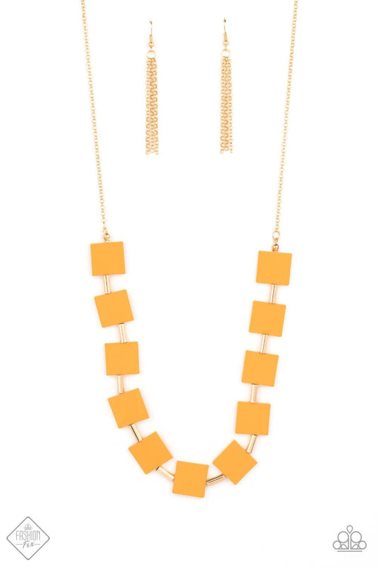 Paparazzi Accessories Hello, Material Girl - Orange Vibrant geometric squares painted in the spring Pantone® of Marigold flare out along a long gold chain as it drapes along the chest. Sleek gold cylinders separate the square plates, adding warm metallic