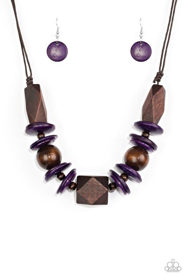Paparazzi Accessories Pacific Paradise - Purple Featuring abstract geometric finishes, mismatched brown wooden beads and vivacious purple accents are threaded along shiny brown cording. A dramatic geometric bead adorns the center, creating a bold summery