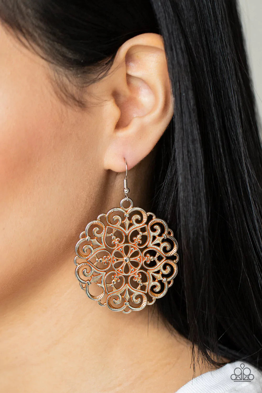 Paparazzi Accessories MANDALA Effect - Orange Brushed in a rustic orange finish, an oversized mandala-like silver frame swings from the ear for a seasonal pop of color. Earring attaches to a standard fishhook fitting. Sold as one pair of earrings. Jewelry