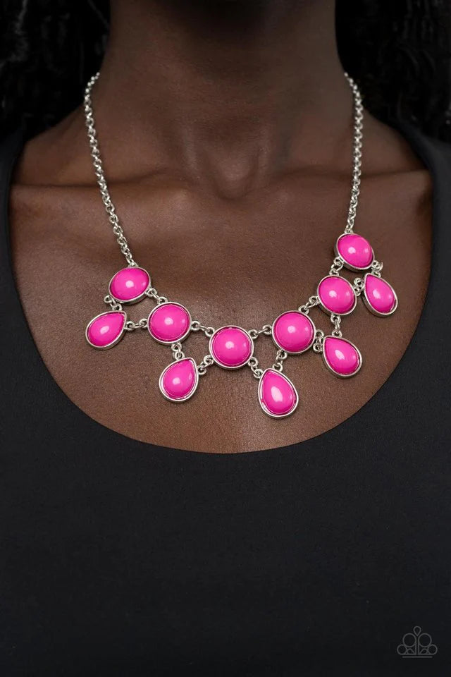 Paparazzi Accessories Very Valley Girl - Pink This bold necklace adds a pop of color to your ensemble. Our "Very Valley Girl" features eye-catching Fuchsia Fedora teardrop beads that link along a bottom row of accessory links. With all this pink chic, it