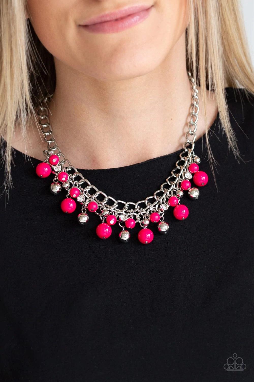 Paparazzi Accessories The Bride to BEAD - Pink Varying in size, a collection of vivacious pink and shiny silver beads swing from the bottom of interlocking silver chains below the collar. A row of glassy white rhinestones are sprinkled along the colorful
