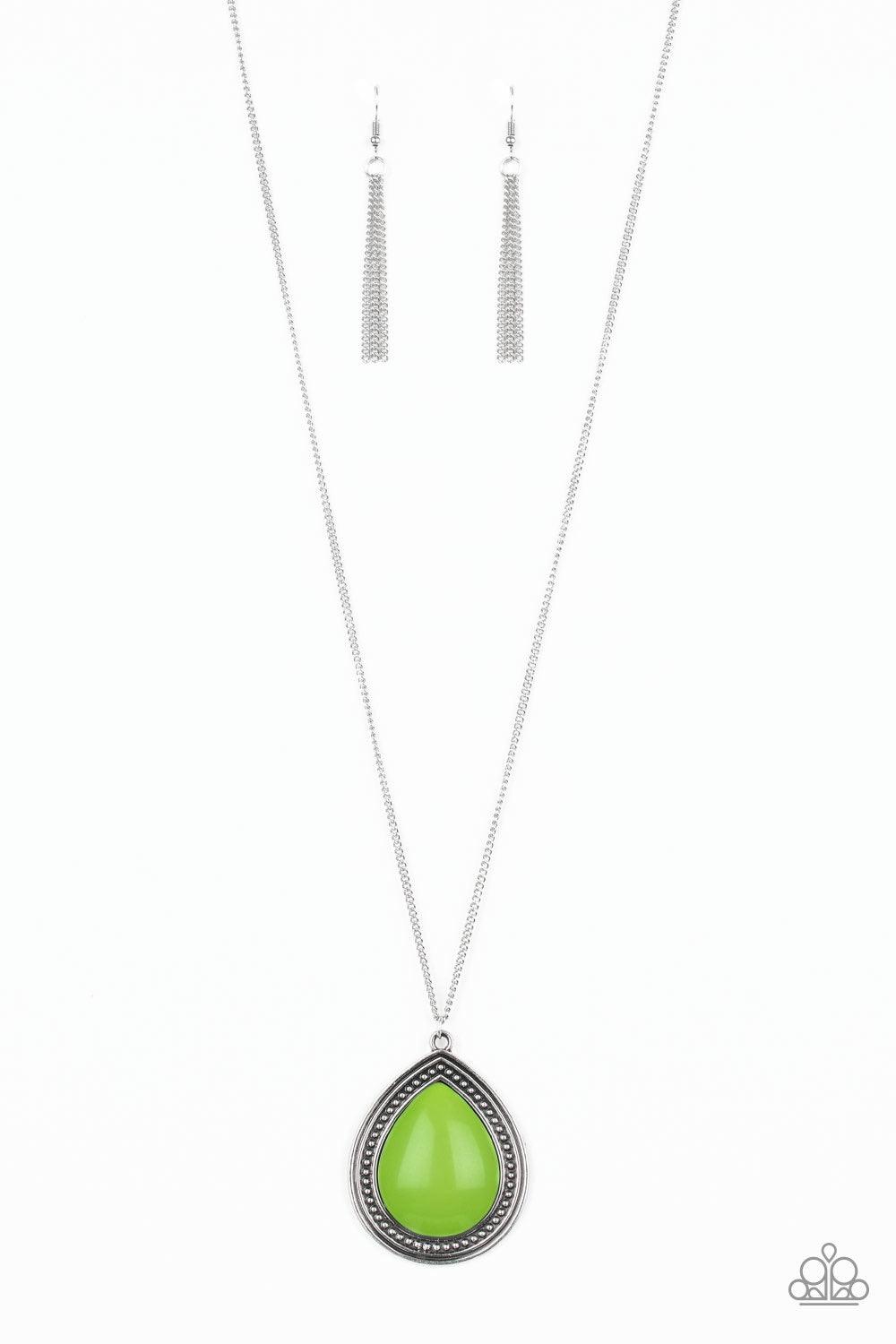 Paparazzi Accessories Chroma Courageous - Green An oversized green bead is pressed into the center of a studded teardrop frame, creating a vibrant pop of color at the bottom of a lengthened silver chain. Features an adjustable clasp closure. Jewelry