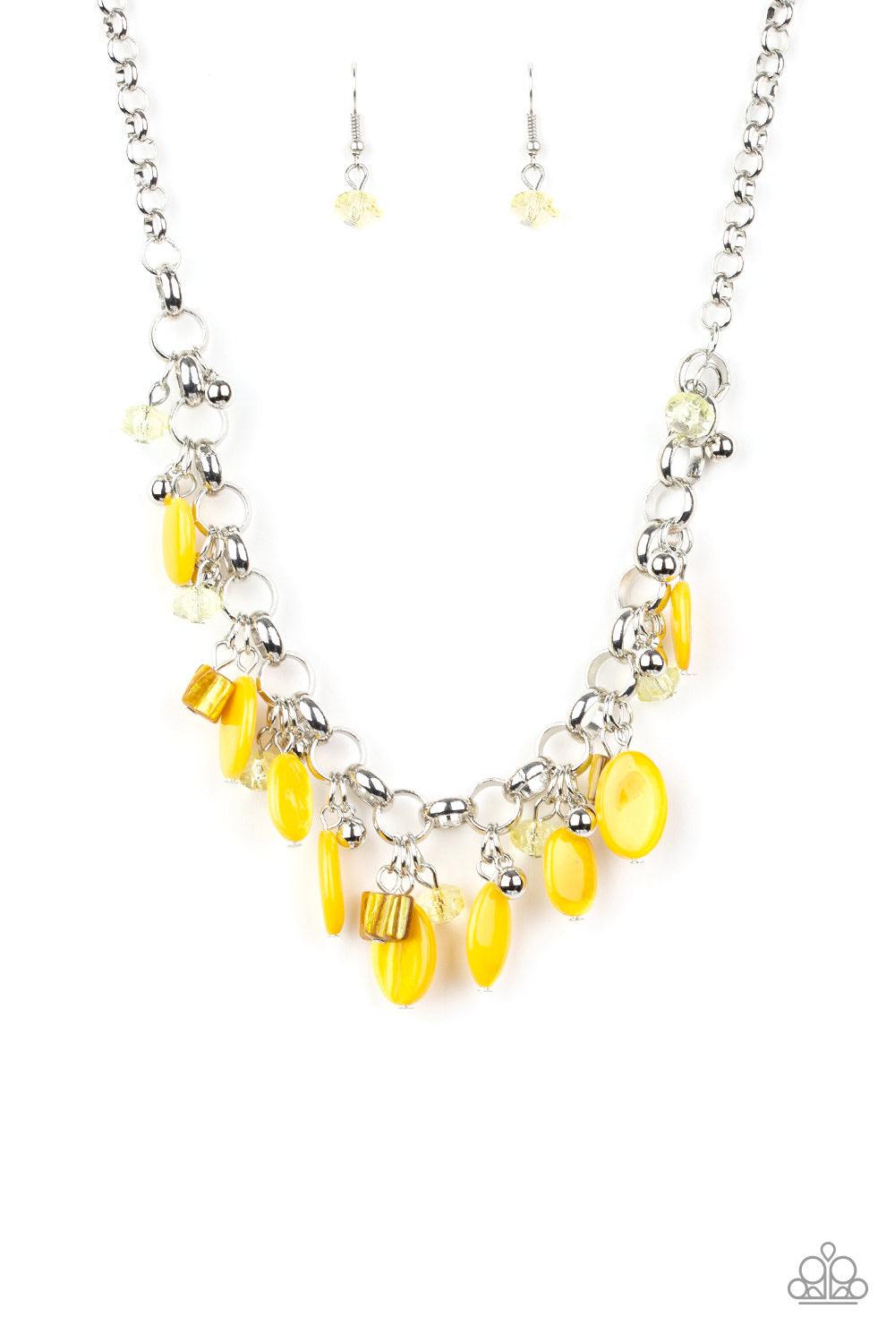 Paparazzi Accessories I Want To SEA The World - Yellow A collection of yellow shell-like beads, yellow crystal-like beads, and shiny silver beads swing from a bold silver chain, creating a whimsical fringe below the collar. Features an adjustable clasp cl