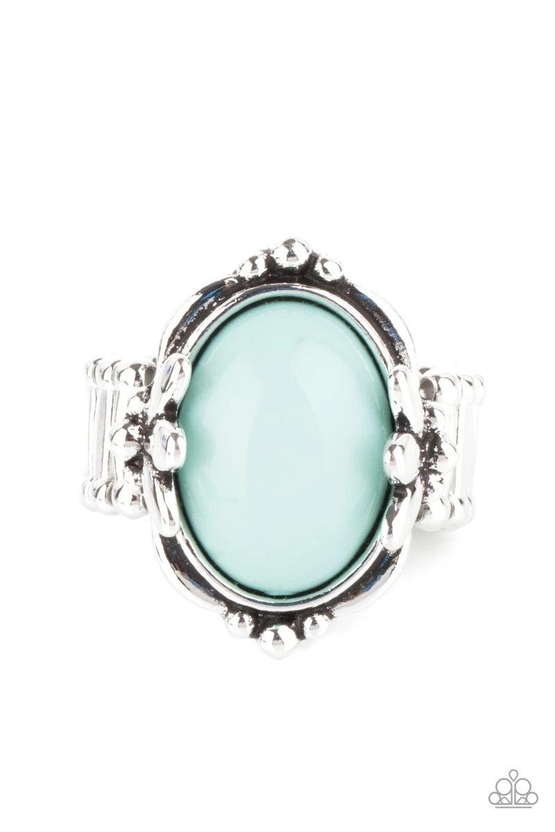 Paparazzi Accessories Springtime Splendor - Blue Featuring leafy silver fittings, a bubbly blue bead is pressed into the center of a studded silver frame for a trendy pop of color. Features a stretchy band for a flexible fit. Sold as one individual ring.