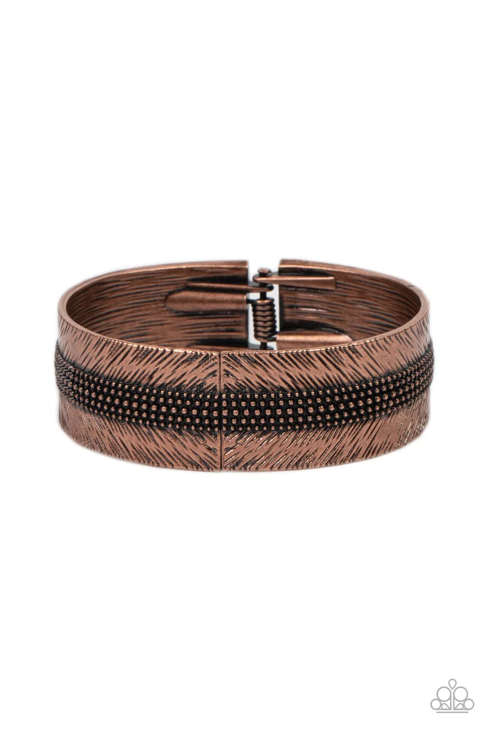 Paparazzi Accessories Rancho Refinement - Copper A thick band of copper is etched in feathery texture, creating a tactile statement piece that boldly wraps around the wrist. Rows of antiqued copper studs travel around the center of the thick copper band,