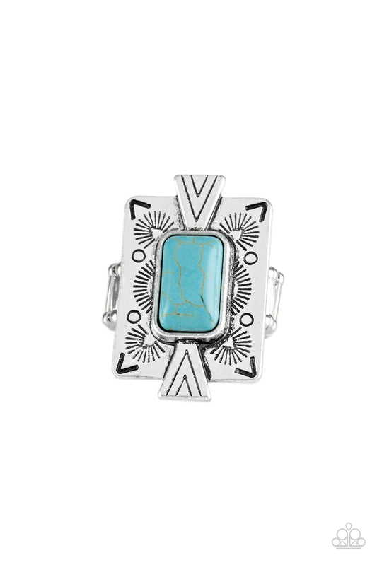 Paparazzi Accessories Stone Cold Couture - Blue Chiseled into a tranquil rectangle, a refreshing turquoise stone is pressed into a bold silver frame radiating with tribal inspired patterns for a seasonal look. Features a stretchy band for a flexible fit.