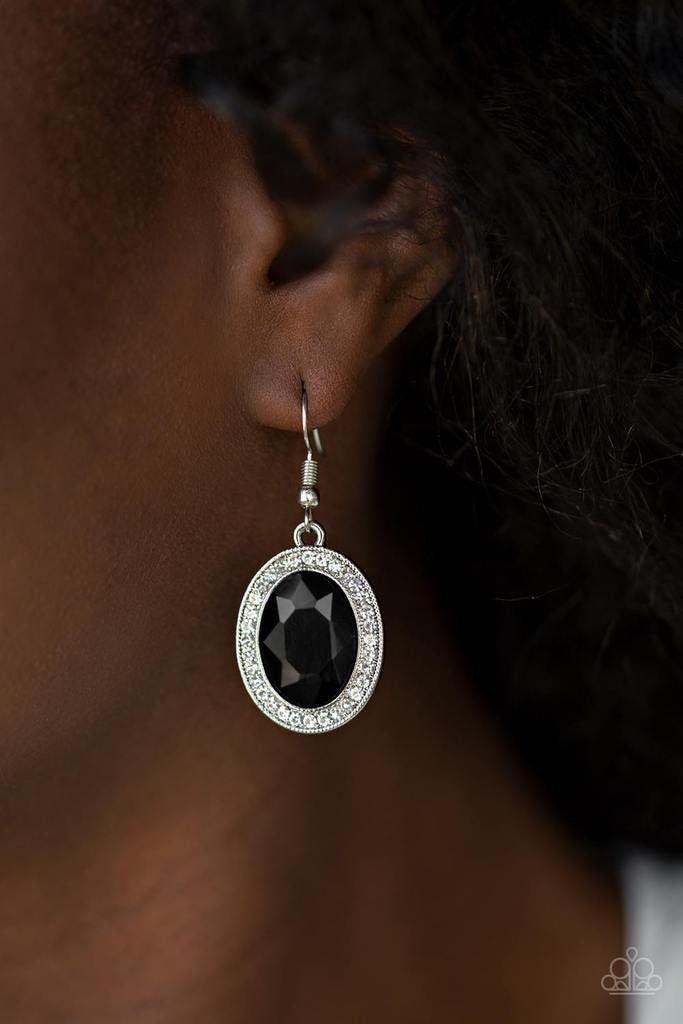 Paparazzi Accessories Only FAME In Town - Black An oversized black gem is pressed into the center of a silver frame radiating with glassy white rhinestones for a glamorous look. Earring attaches to a standard fishhook fitting. Jewelry