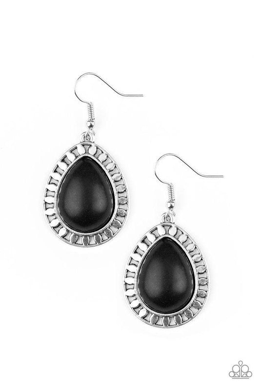 Paparazzi Accessories Sahara Serenity - Black Chiseled into a tranquil teardrop, a smooth black stone is pressed into a shimmery silver frame radiating with tribal inspired textures for a seasonal look. Earring attaches to a standard fishhook fitting. Sol