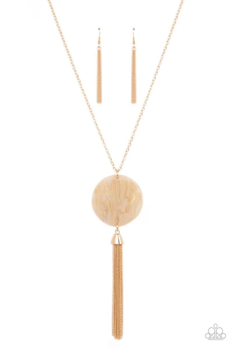 Paparazzi Accessories Up FAUX Grabs - White A dramatic gold chain tassel swings from the bottom of an oversized shell-like acrylic disc, creating a fabulously stacked pendant at the bottom of a lengthened gold chain. Features an adjustable clasp closure.
