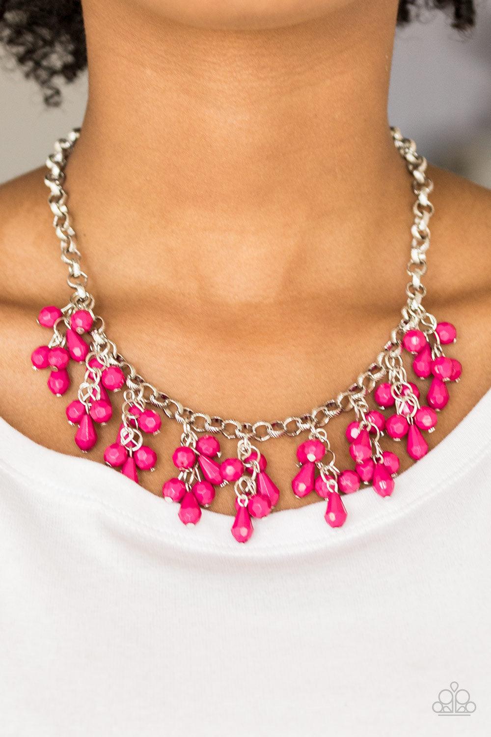 Paparazzi Accessories Modern Macarena - Pink Featuring round and teardrop shapes, clusters of faceted pink beads swing from the bottom of a shimmery silver chain, creating a playful fringe below the collar. Features an adjustable clasp closure. Jewelry