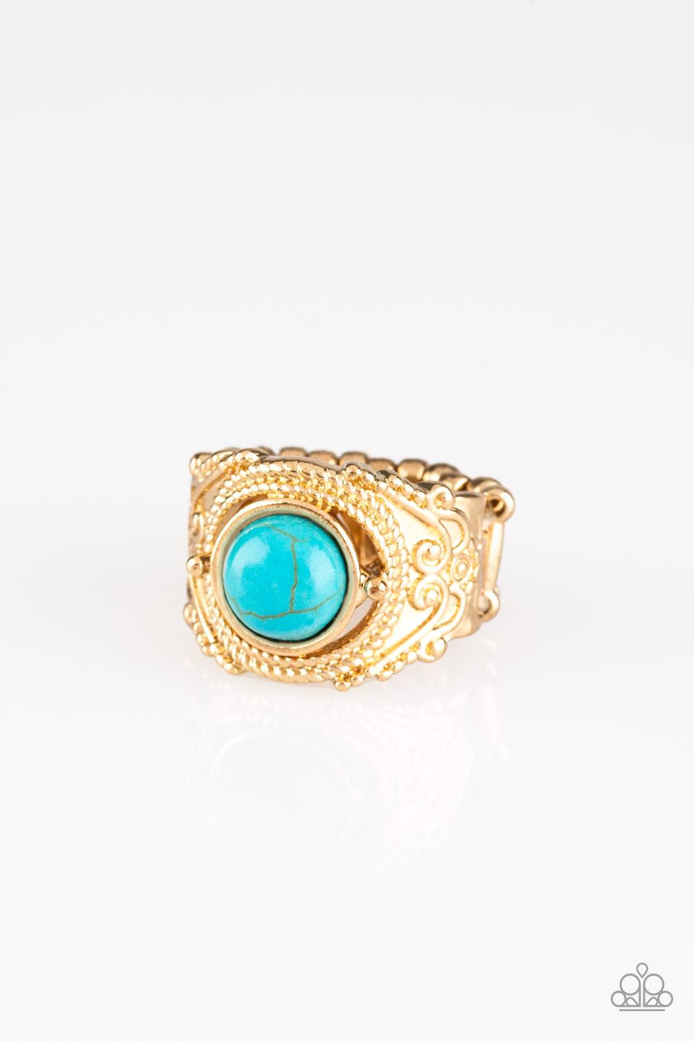 Paparazzi Accessories Stand Your Ground - Gold A refreshing turquoise stone is pressed into an ornate gold band radiating with rope-like and studded textures for a seasonal look. Features a stretchy band for a flexible fit. Jewelry