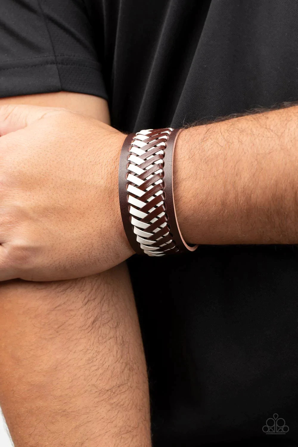 Paparazzi Accessories Punk Rocker Road - Brown Brown and white leather laces decoratively crisscross across the front of a thick brown leather band, resulting in a rebellious pop of color around the wrist. Features an adjustable snap closure. Sold as one