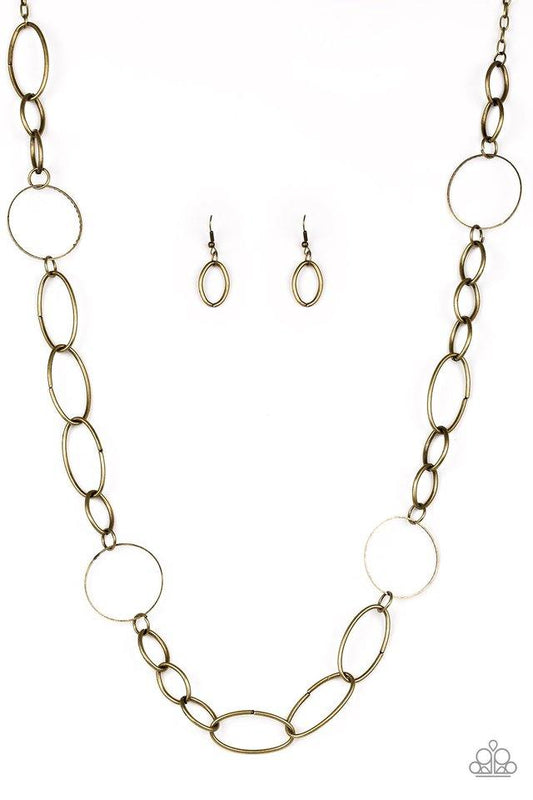 Paparazzi Accessories Perfect MISMATCH - Brass An array of smooth and textured brass hoops connect across the chest, creating a bold mismatched palette. Features an adjustable clasp closure. Sold as one individual necklace. Includes one pair of matching e