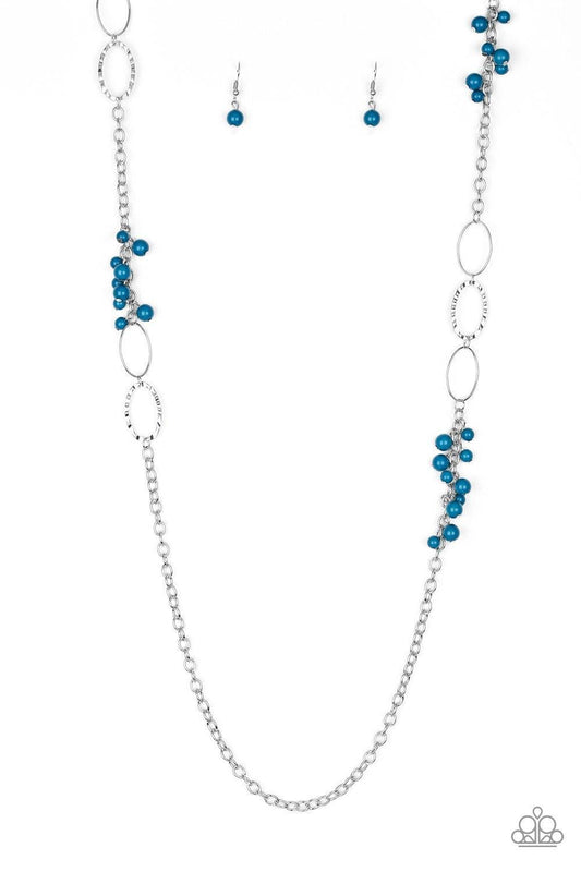 Paparazzi Accessories Flirty Foxtrot - Blue Smooth and hammered silver rings join clusters of refreshing blue beads along a shimmery silver chain for a colorful look. Features an adjustable clasp closure. Sold as one individual necklace. Includes one pair