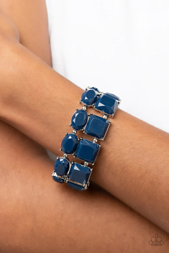 Paparazzi Accessories Don’t Forget Your Toga - Blue Separated by pairs of dainty silver beads, faceted stacks of oval and square cut blue beads are threaded along a stretchy band around the wrist for a refreshing pop of color. Sold as one individual brace