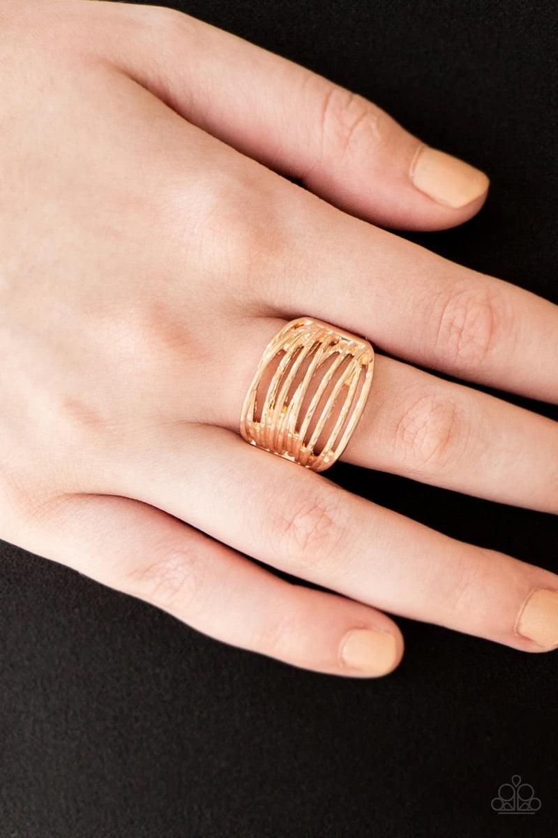 Paparazzi Accessories Give Me Space - Gold Glistening rose gold bands race across the finger, creating an airy layered band. Features a stretchy band for a flexible fit. Sold as one individual ring. Jewelry