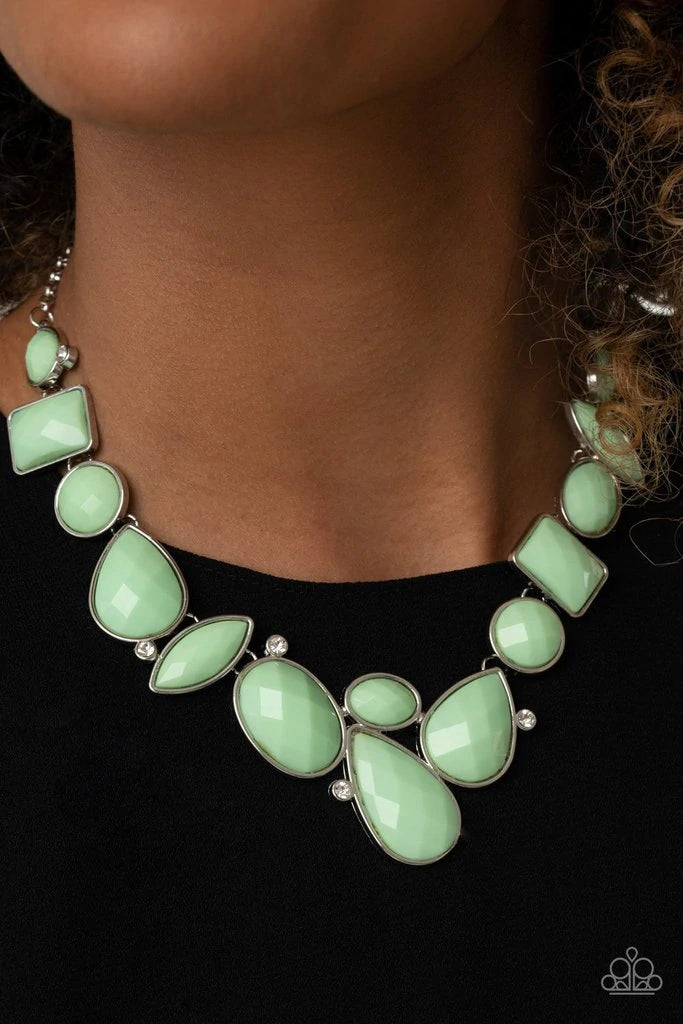 Paparazzi Accessories Mystical Mirage - Green Encased in sleek silver frame, minty green beads create refreshing fringe below the collar. Features an adjustable clasp closure. Sold as one individual necklace with matching earrings. Paparazzi accessories a
