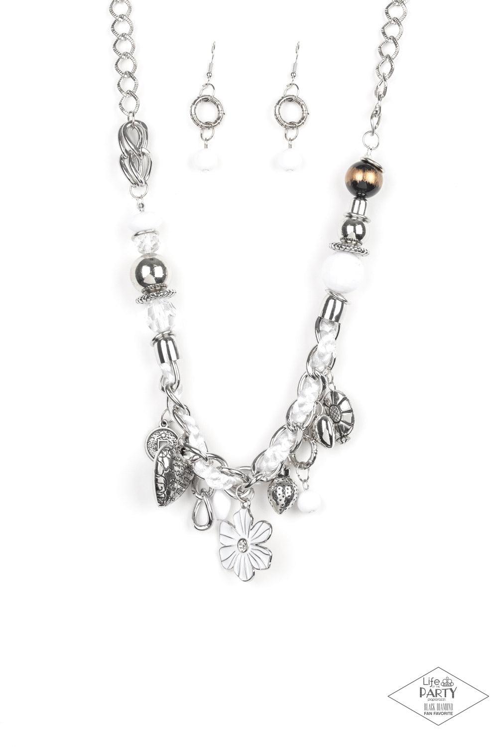 Paparazzi Accessories Charmed, I Am Sure - White White and ivory cording is braided through a chunky silver chain. A unique variety of charms decorate the piece including a delicate flower and a heart inscribed with the phrase "With All My Heart" on one s