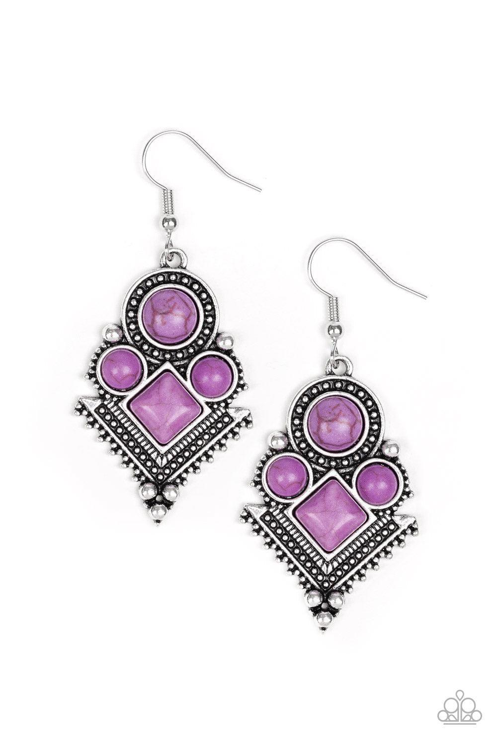 Paparazzi Accessories So Sonoran ~Purple Chiseled into round and square beads, vivacious purple stones are pressed into an ornate geometric frame radiating with shimmery silver studs for a tribal inspired look. Earring attaches to a standard fishhook fitt