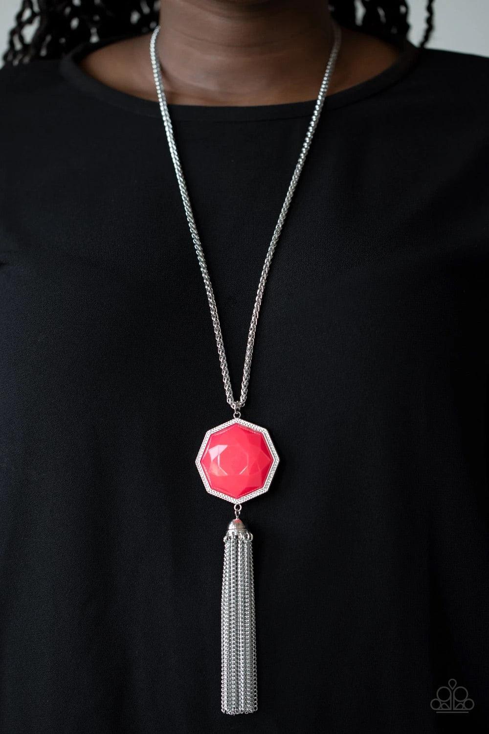 Paparazzi Accessories Prismatically Polygon - Pink Featuring a faceted surface, a neon pink bead is pressed into the center of a decorative silver polygon frame at the bottom of an ornate silver chain. Capped in a silver bead, shimmery silver chains strea