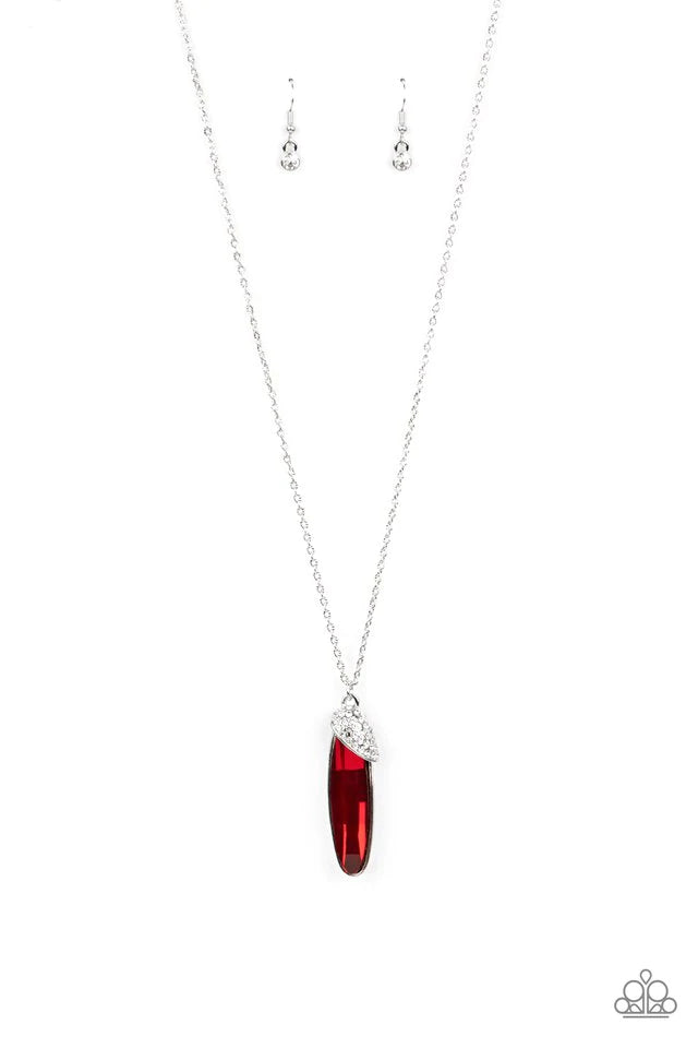 Paparazzi Accessories Spontaneous Sparkle - Red A white rhinestone encrusted silver fitting slants across the top of an oversized oval red rhinestone, creating a glamorous pendant at the bottom of a lengthened silver chain. Features an adjustable clasp cl