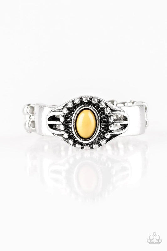 Paparazzi Accessories Right on TREK - Yellow An earthy yellow bead is pressed into the center of a dainty silver band radiating with tribal inspired textures for a seasonal look. Features a dainty stretchy band for a flexible fit. Sold as one individual r