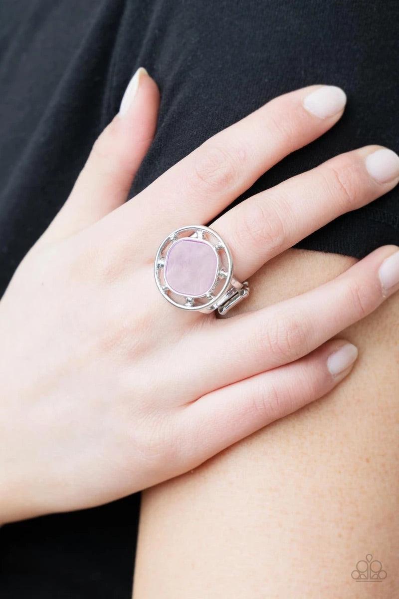 Paparazzi Accessories Encompassing Pearlescence ~ Pink A pearly purple square bead, featuring rounded edges, is encircled with an airy silver compass-like frame creating a shimmering centerpiece atop the finger. Features a stretchy band for a flexible fit