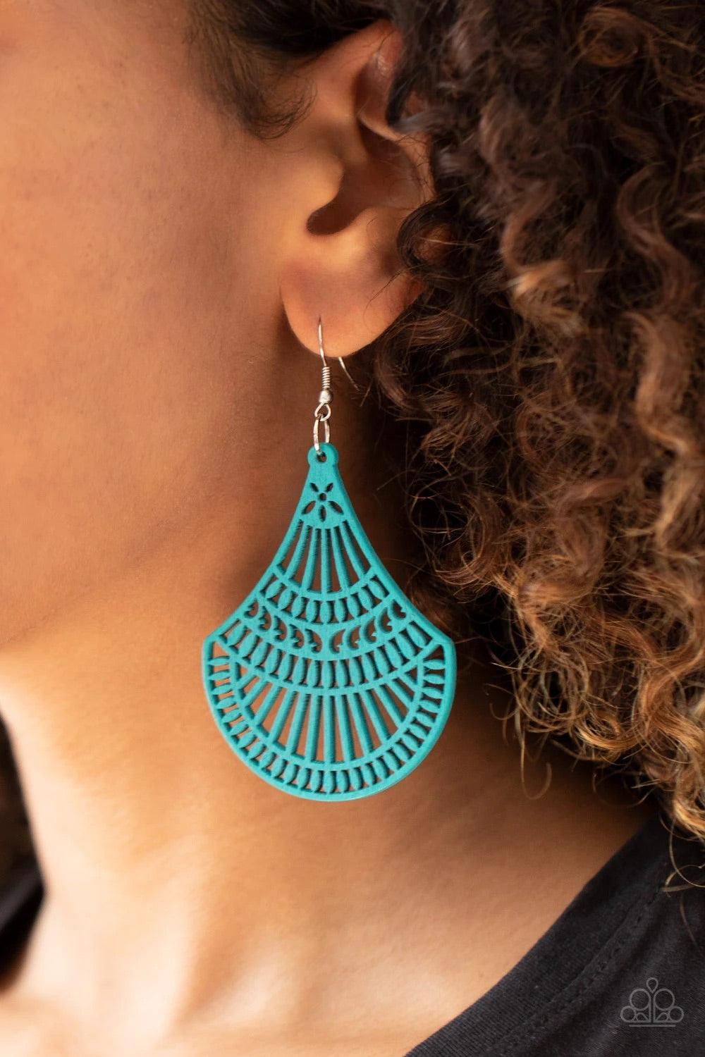 Paparazzi Accessories Tropical Tempest ~Blue Painted in a refreshing blue finish, a wooden teardrop-like frame is cut into an airy stenciled pattern for a colorfully seasonal look. Earring attaches to a standard fishhook fitting. Sold as one pair of earri