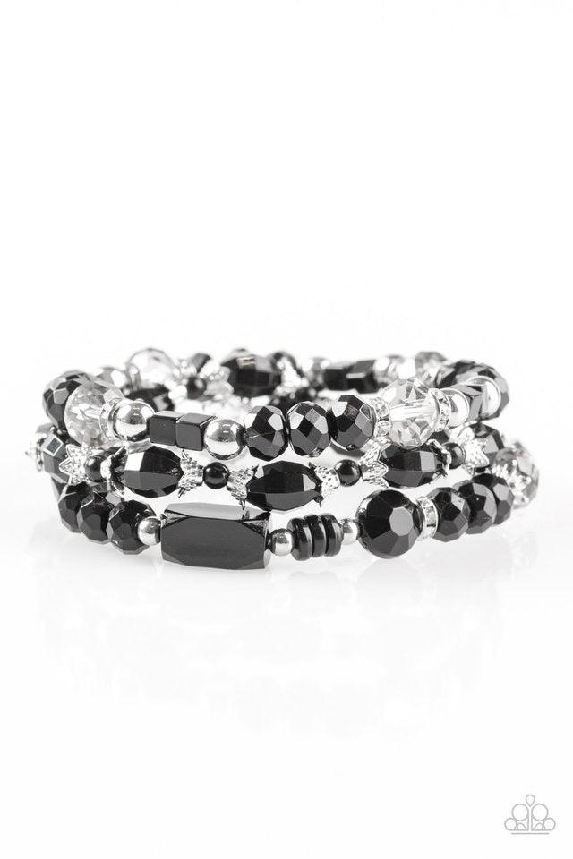 Paparazzi Accessories Girl Boss - Black Encrusted in glittery white rhinestones, shimmery silver rings, classic silver beads, and neutral black beads are threaded along three stretchy elastic bands. Faceted crystal-like beads are sprinkled between the col