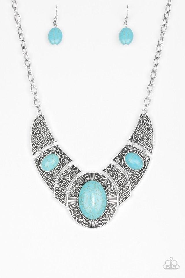 Paparazzi Accessories Leave Your LANDMARK - Blue Radiating with studded and tribal inspired patterns, antiqued silver plates connect below the collar for a fierce look. Refreshing turquoise stones are pressed into the plates, adding an artisan flair to th
