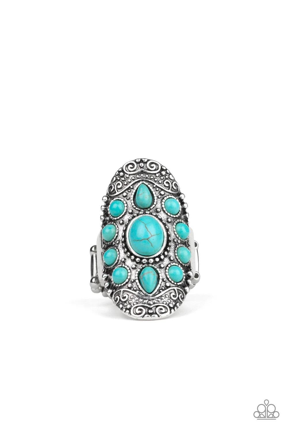 Paparazzi Accessories Stone Sunrise - Blue Embossed in a studded filigree pattern, an oval silver frame folds around the finger. Featuring round, oval, and teardrop shapes, refreshing turquoise stone beads are pressed into the center of the frame, creatin