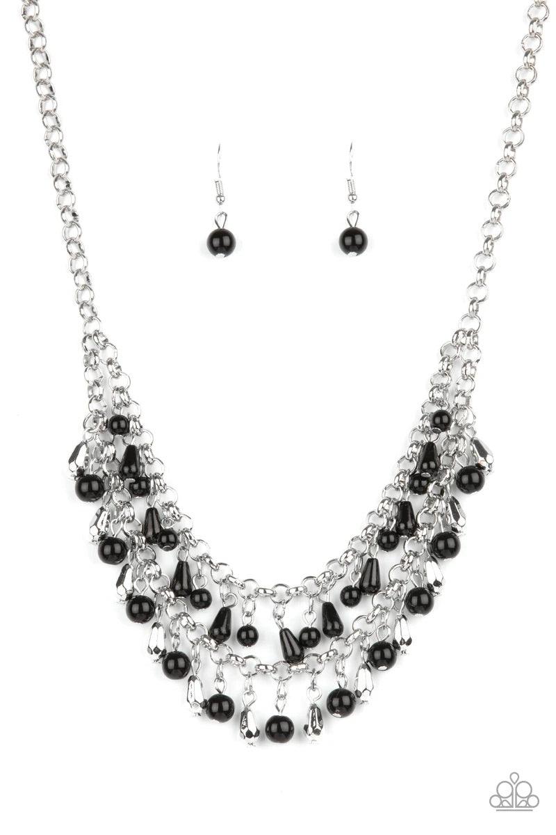 Paparazzi Accessories Big Money - Black A glamorous collection of bubbly black beads, faceted silver beads, and shiny black teardrop beads alternate along two strands of chunky silver chains, creating a flirtatious fringe below the collar. Features an adj