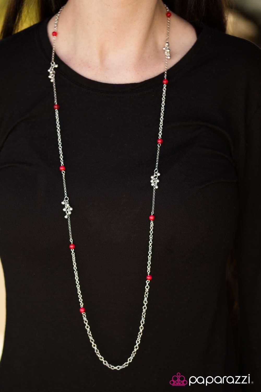 Paparazzi Accessories Twinkling Twilight - Red Red beads trickle down an elongated silver chain, creating a whimsical display. Clusters of dainty silver beads create fun and flirty accents as they trickle down the chain. Features an adjustable clasp closu