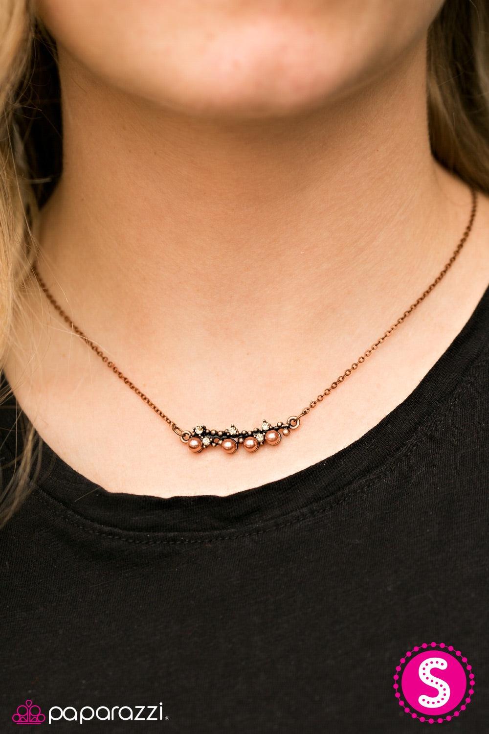 Paparazzi Accessories The Seven Year RICH - Copper Encrusted in golden topaz rhinestones and pearly copper beading, a dainty pendant copper pendant falls just below the collar in a refined fashion. Features an adjustable clasp closure. Jewelry