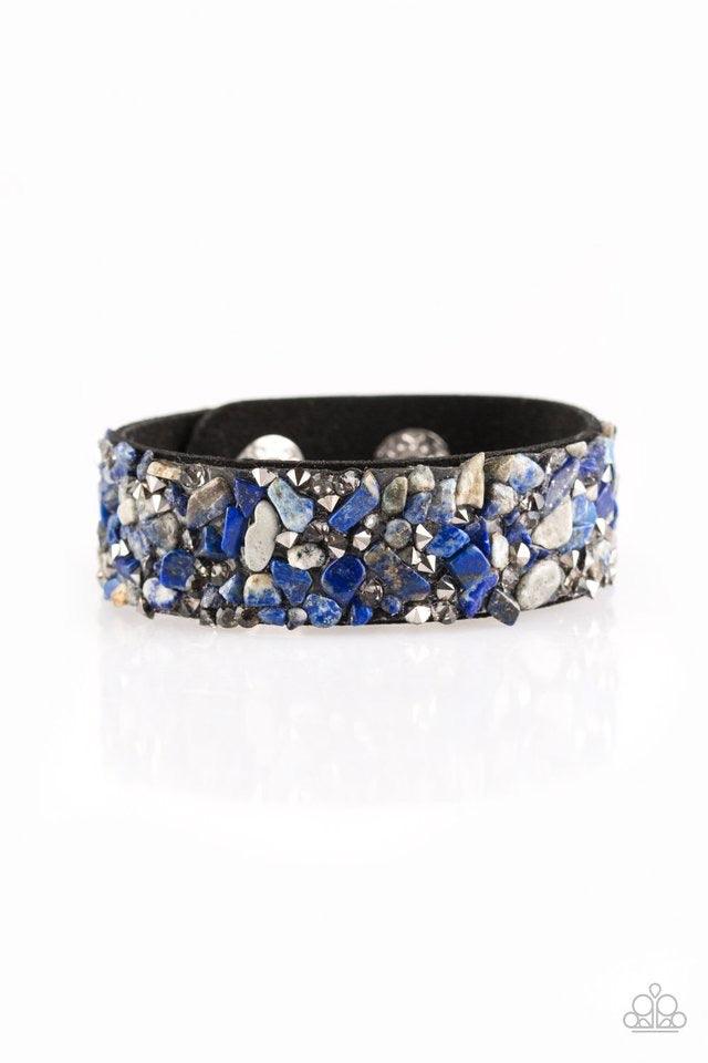 Paparazzi Accessories Totally Crushed It ~Blue Bits of crushed blue stone is encrusted along the front of a black suede band. Smoky and hematite rhinestones are sprinkled along the band, adding edgy shimmer to the sassy seasonal palette. Features an adjus