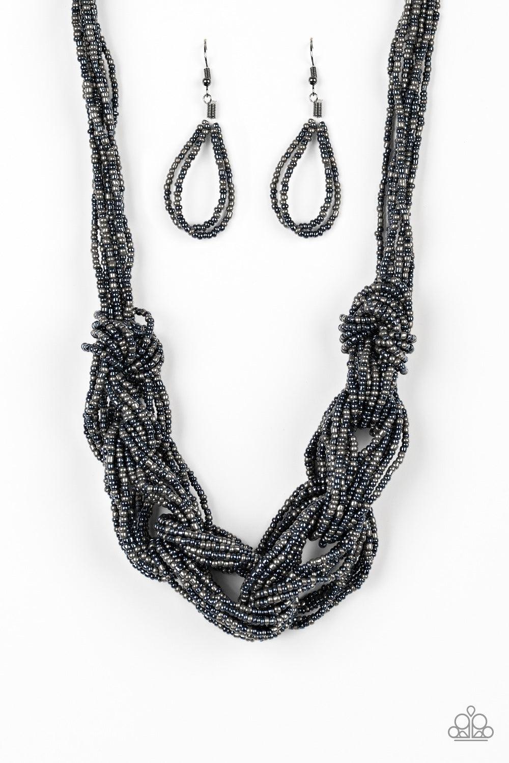 Paparazzi Accessories City Catwalk - Blue Brushed in a flashy metallic finish, countless strands of blue and gunmetal seed beads weave into a bulky square braid below the collar for a glamorous look. Features an adjustable clasp closure. Sold as one indiv