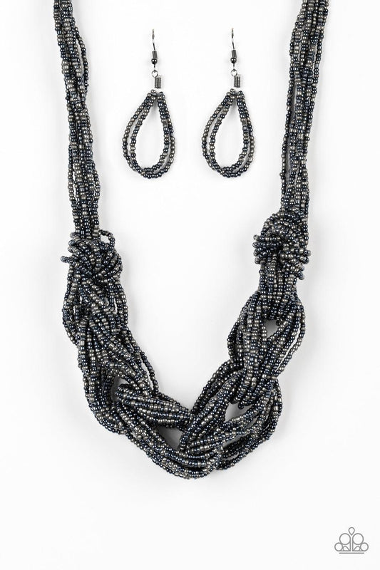 Paparazzi Accessories City Catwalk - Blue Brushed in a flashy metallic finish, countless strands of blue and gunmetal seed beads weave into a bulky square braid below the collar for a glamorous look. Features an adjustable clasp closure. Sold as one indiv