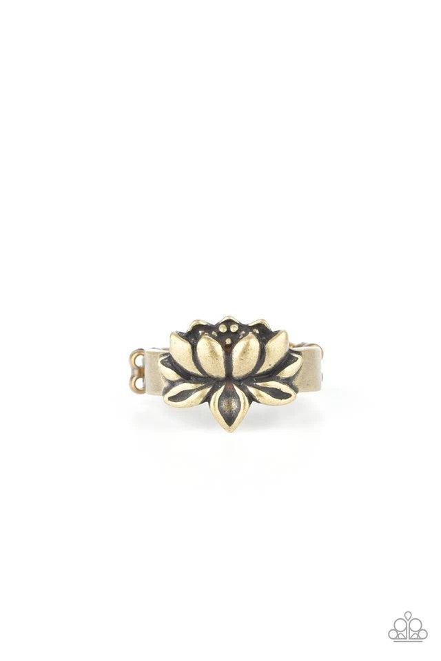 Paparazzi Accessories Lotus Crowns - Brass Brushed in antiqued shimmer, a lifelike brass lotus embellishes the center of a dainty brass band for a whimsical look. Features a dainty stretchy band for a flexible fit. Jewelry