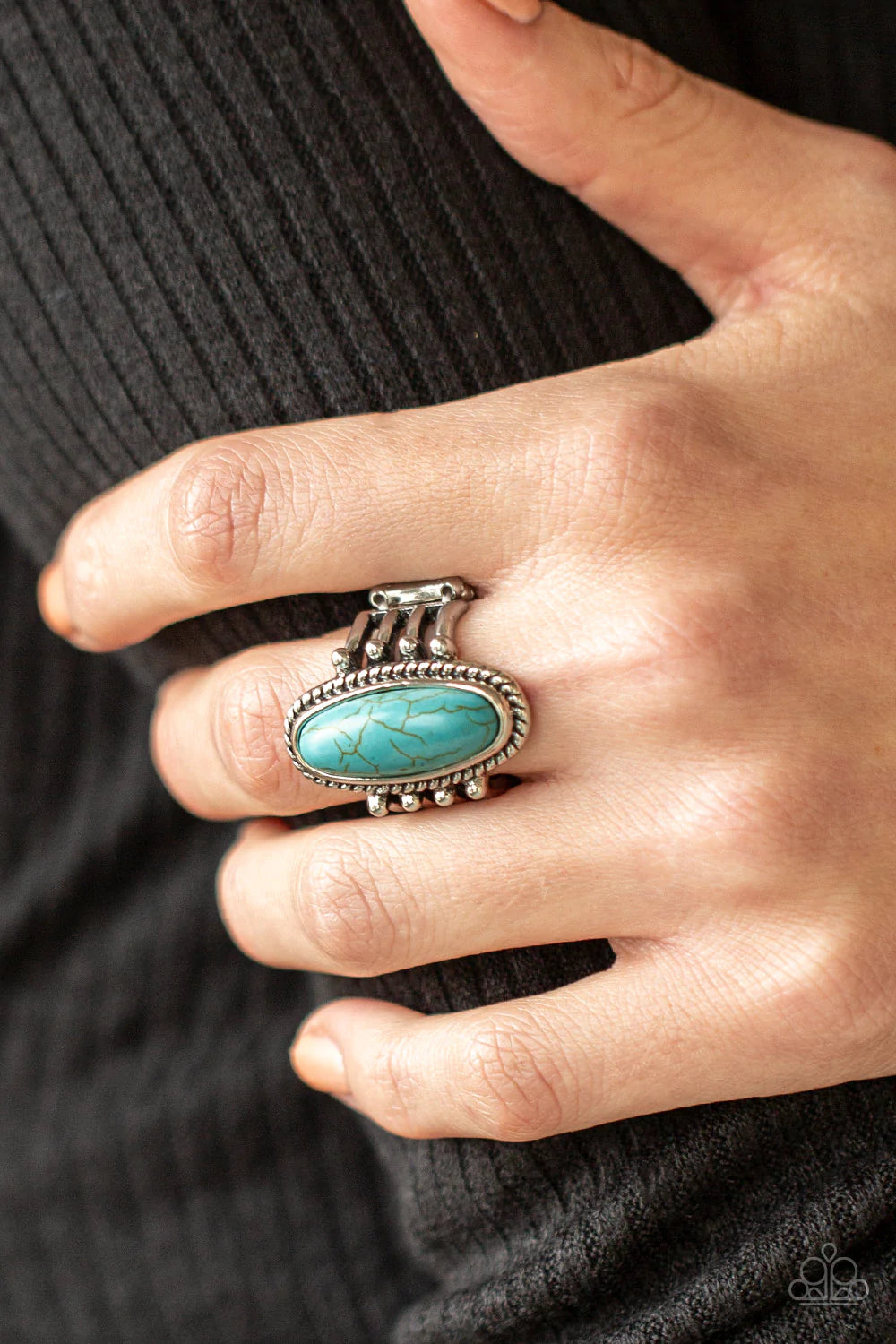 Paparazzi Accessories Home on the Ranch - Blue An oblong turquoise stone is pressed into the center of a textured silver frame attached to the studded ends of layered silver bands, creating a colorful rustic centerpiece atop the finger. Features a stretch