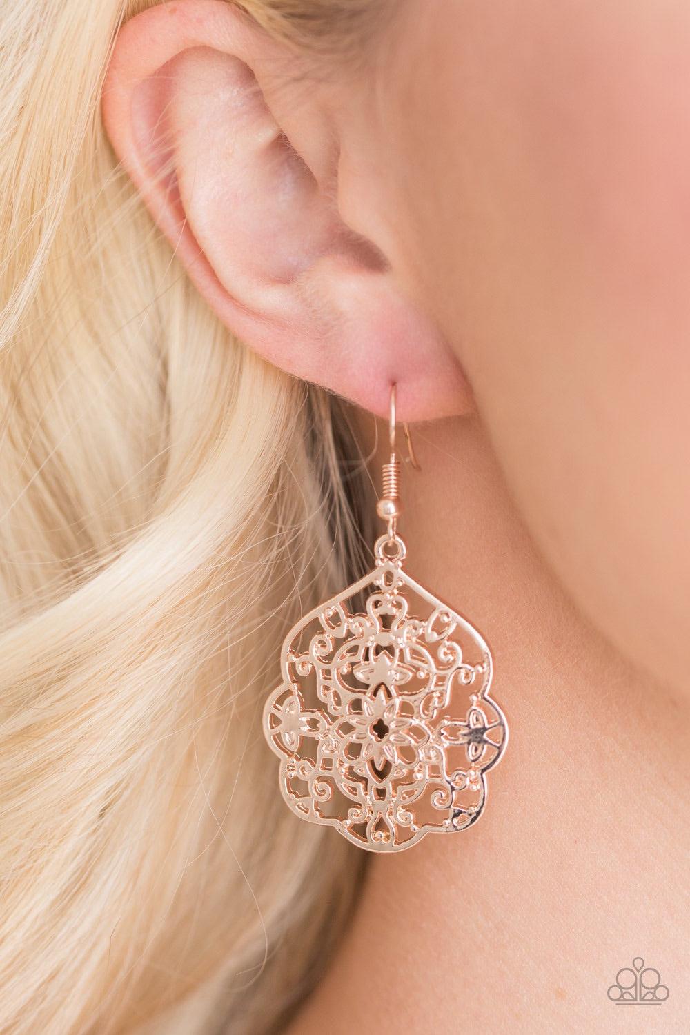 Paparazzi Accessories Garden Guru - Rose Gold Brushed in a glistening rose gold finish, floral filigree climbs a scalloped frame, creating a whimsical lure. Earring attaches to a standard fishhook fitting. Jewelry