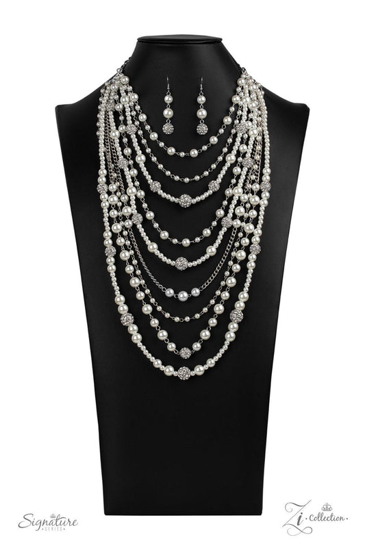 Paparazzi Accessories The LeCricia 💗💗ZiCollection $25💗💗 An elegant collection of timeless white pearls, shiny sections of silver chain, and bedazzling white rhinestone encrusted silver beads effortlessly cascade down the chest. The vintage inspired la