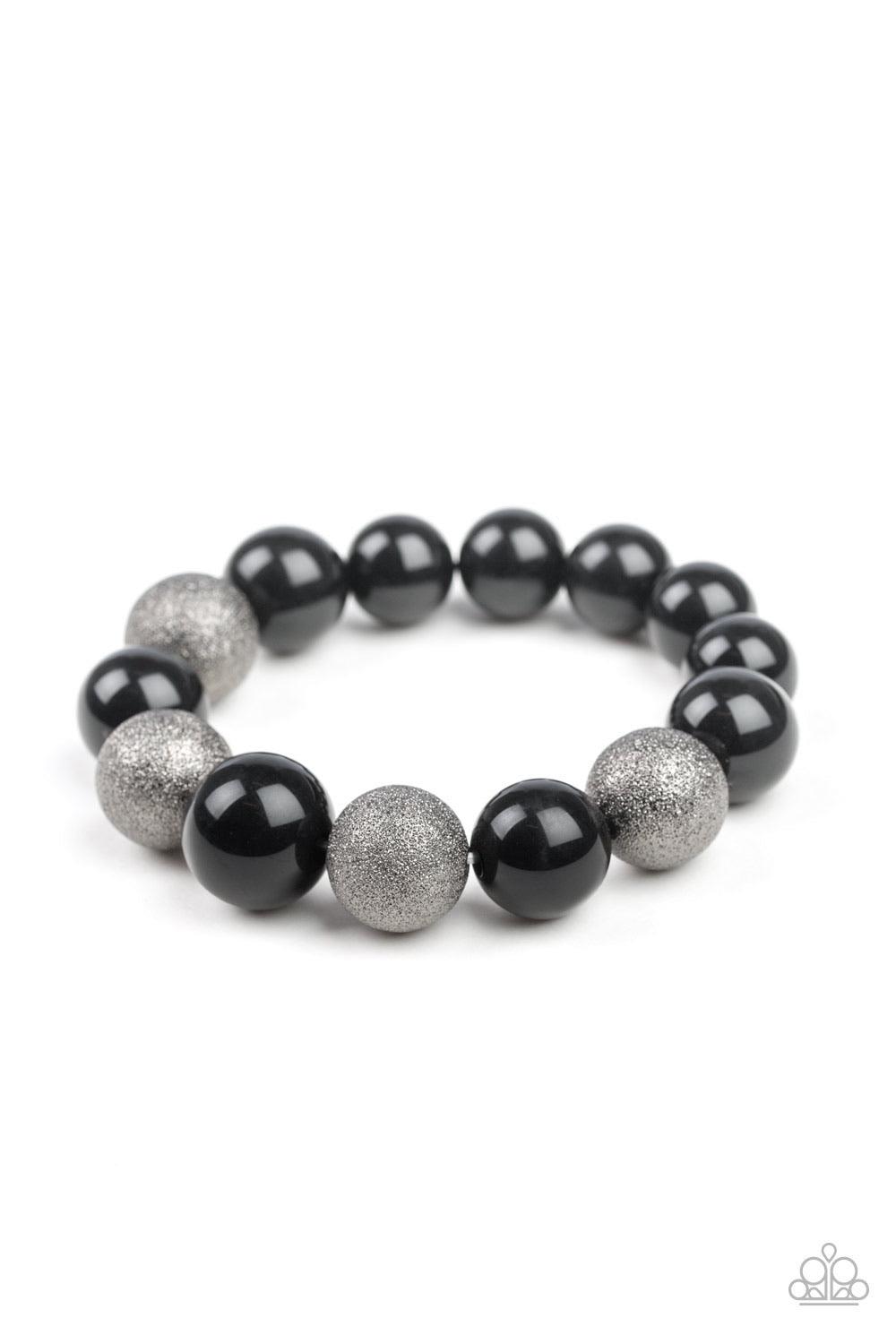Paparazzi Accessories Humble Hustle - Black Dusted in glitter, sparkling gunmetal and shiny black beads are threaded along a stretchy band around the wrist for a glamorous look. Sold as one individual bracelet. Jewelry