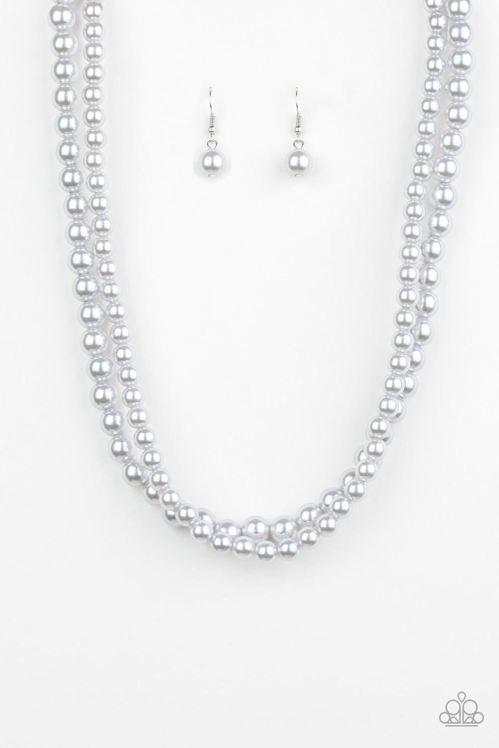 Paparazzi Accessories Woman of the Century ~Silver Two strands of classic gray pearls are strung along invisible wires below the collar. Each strand slightly varies in size, adding a modern twist to the timeless pearl palette. Features an adjustable clasp