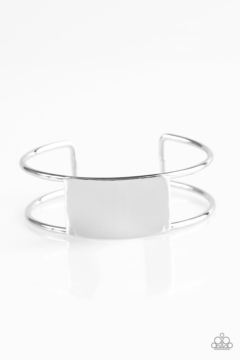 Paparazzi Accessories Set The SHEEN - Silver Glistening silver bars curl around the wrist, creating an airy cuff. Brushed in a high sheen finish, a shimmering silver frame adorns the center of the cuff for an edgy finish. Jewelry