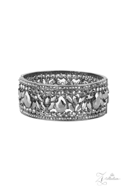 Paparazzi Accessories After Party Powerhouse: ZiCollection A smoldering collection of oversized teardrop and marquise cut hematite rhinestones haphazardly coalesce between linear stacked rows of round hematite rhinestones. The dazzling hematite spangled g