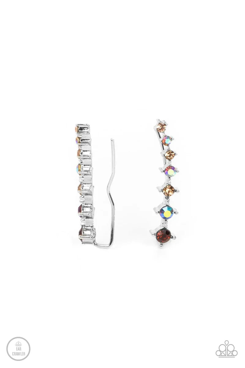 Paparazzi Accessories STARLIGHT Show - Brown An iridescent spectrum of dainty topaz rhinestones gradually increase in intensity as they climb the ear for a stellar fashion. Features an extended post fitting that climbs the back of the ear and can be press